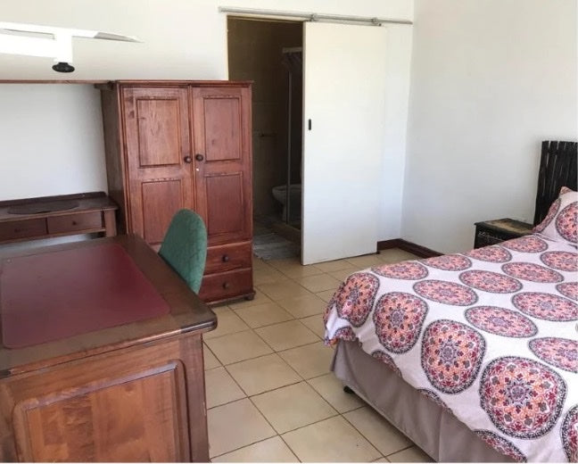 Bedroom with wardrobe and desk